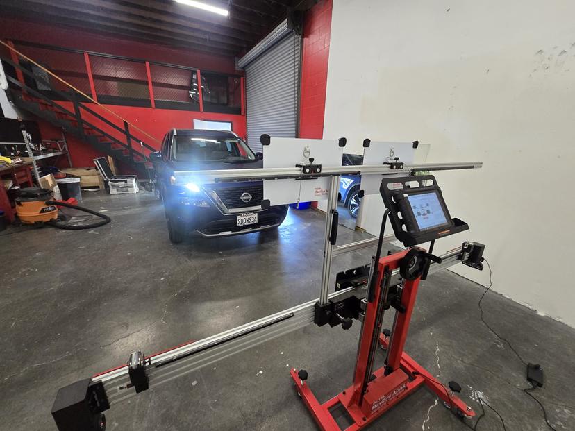Auto glass repair technician at work